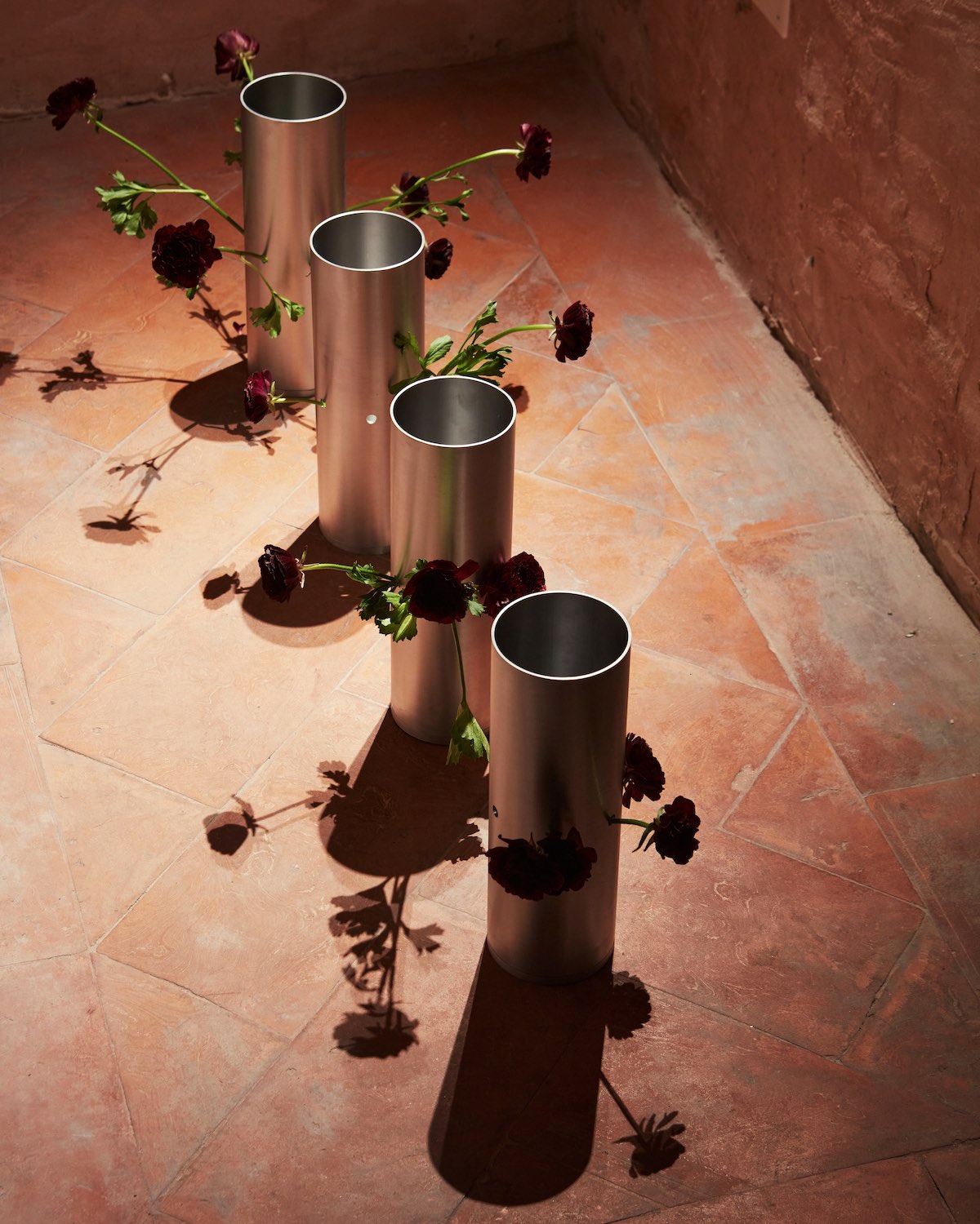 Aluminium vase with side perforations, design Claudia Girbau – Photo © Frank Stellano